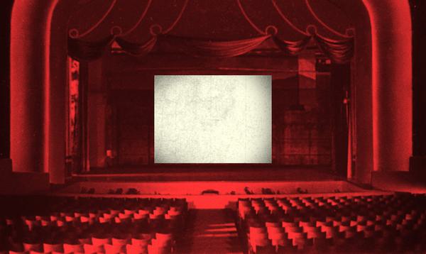 An empty stage lit in red