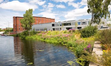 exterior landscape of Rockvilla building and adjacent canal