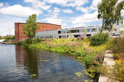 exterior landscape of Rockvilla building and adjacent canal