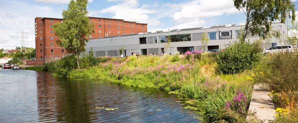 exterior landscape of Rockvilla building and adjacent canal