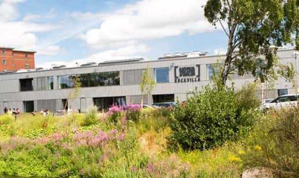 exterior of Rockvilla building and landscape
