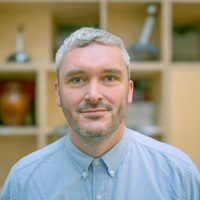 Headshot of Adam McDougall