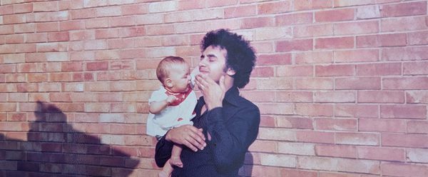 an old family photo of artist Hanna Lavery being held by her father when she was a baby