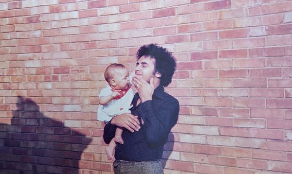an old family photo of artist Hanna Lavery being held by her father when she was a baby