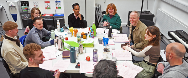 A group shot of the people behind Maggie & me discussing its production.